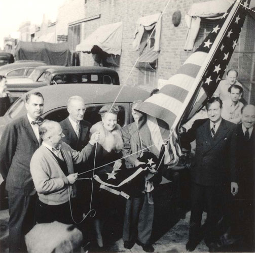 Corkboard - Ed Reichenbach at Altec flag raising ceremony. Circa 1944